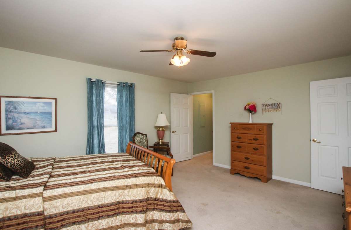 This is the owner's suite with the doorway  has a huge walk in closet and the en suite bathroom