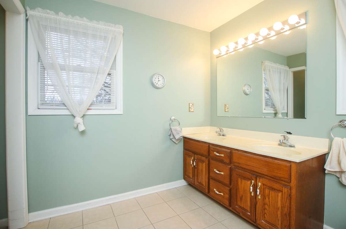 Once again, notice the double sinks and the light filled room!
