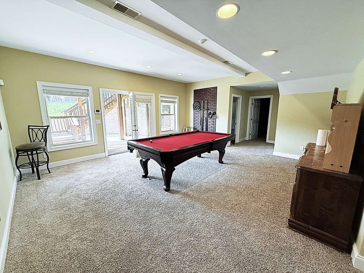 out side movie room facing pool table