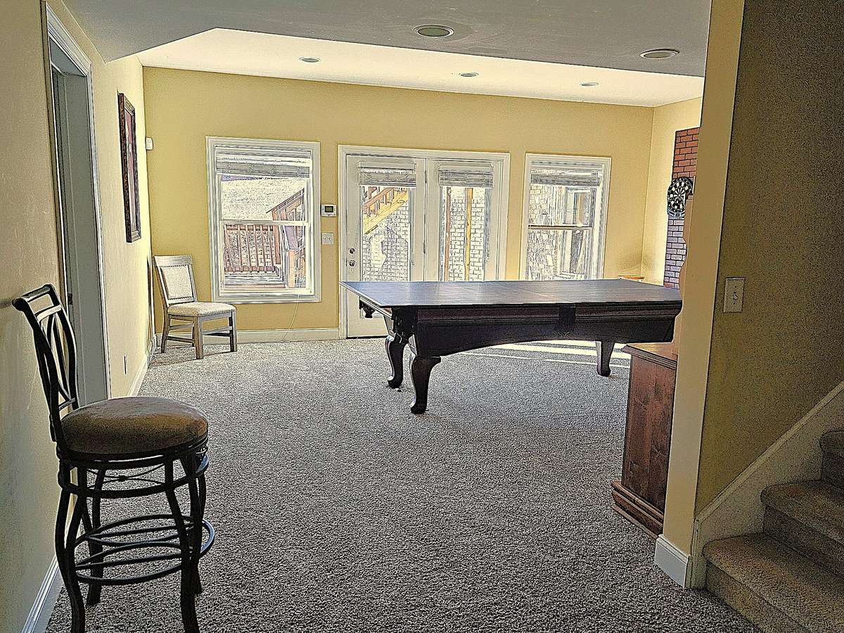 in front of room 1 facing pool table