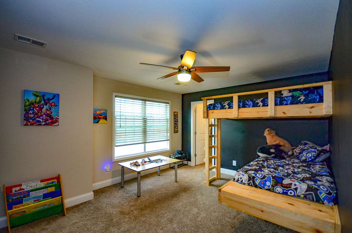 Bedroom 2 contains custom, built-in bunk beds. The bed will convey with the sale, unless you'd like it removed, walls patched.