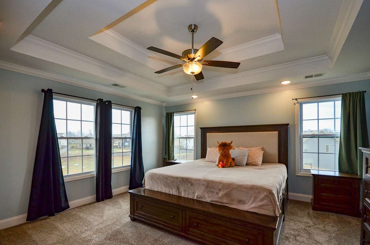Owner Suite: Tray Ceiling, two walk-in closets, a luxury shower, and great views