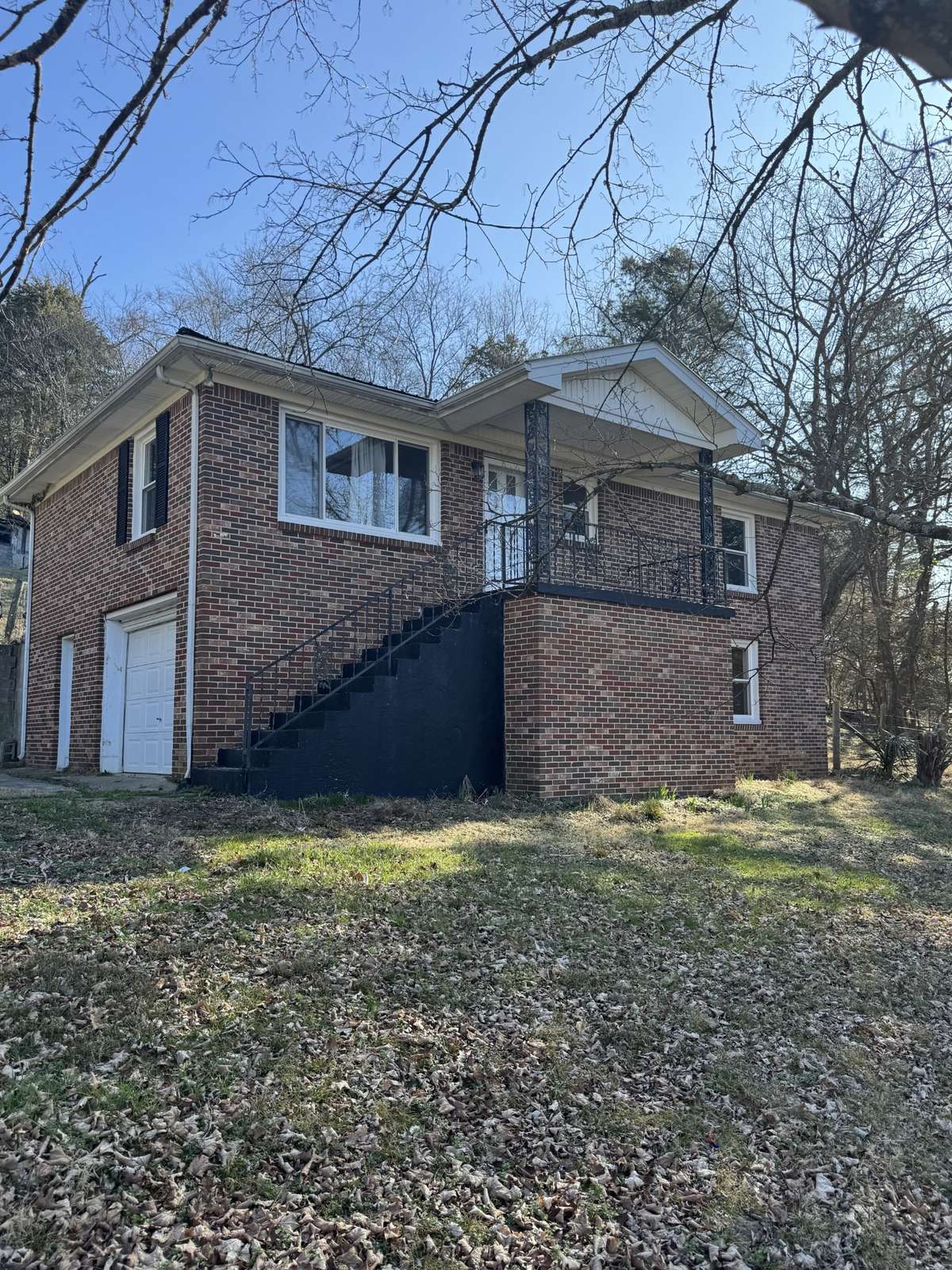 FRONT AND SIDE OF HOME