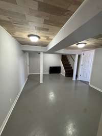 FINISHED BASEMENT GREAT FOR BONUS ROOM OR MAN-WOMAN CAVE