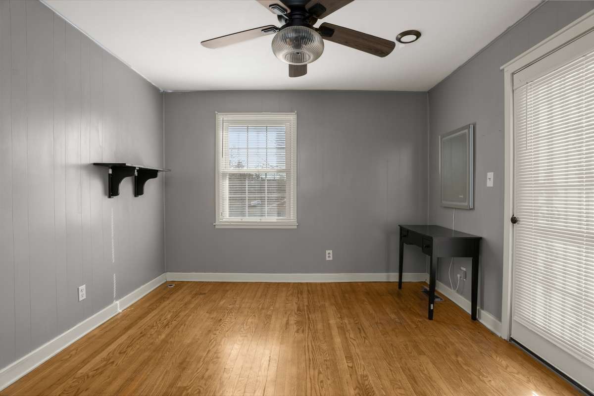 Bedroom #3 has hardwood floors.