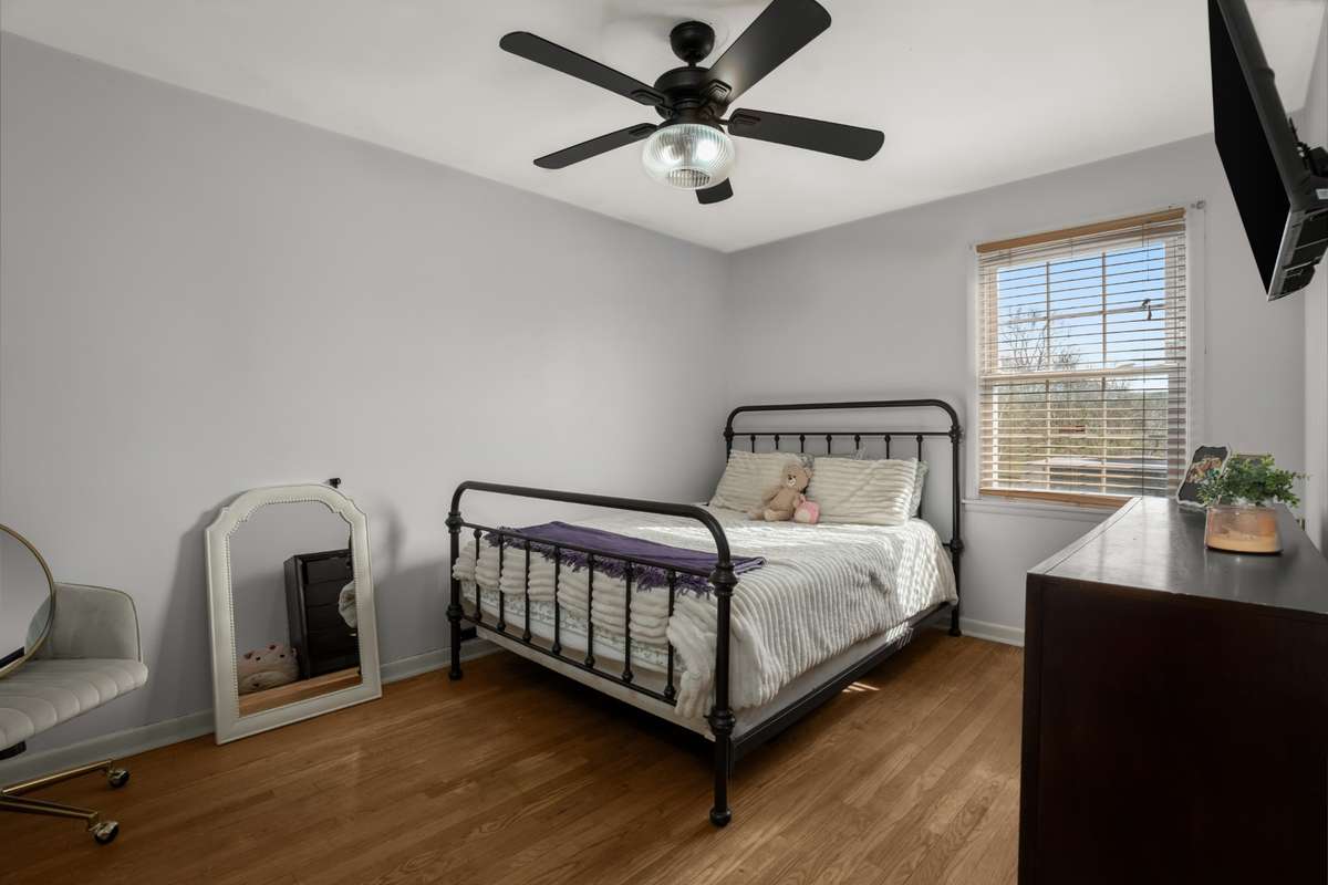 Bedroom #4 has hardwood floors.