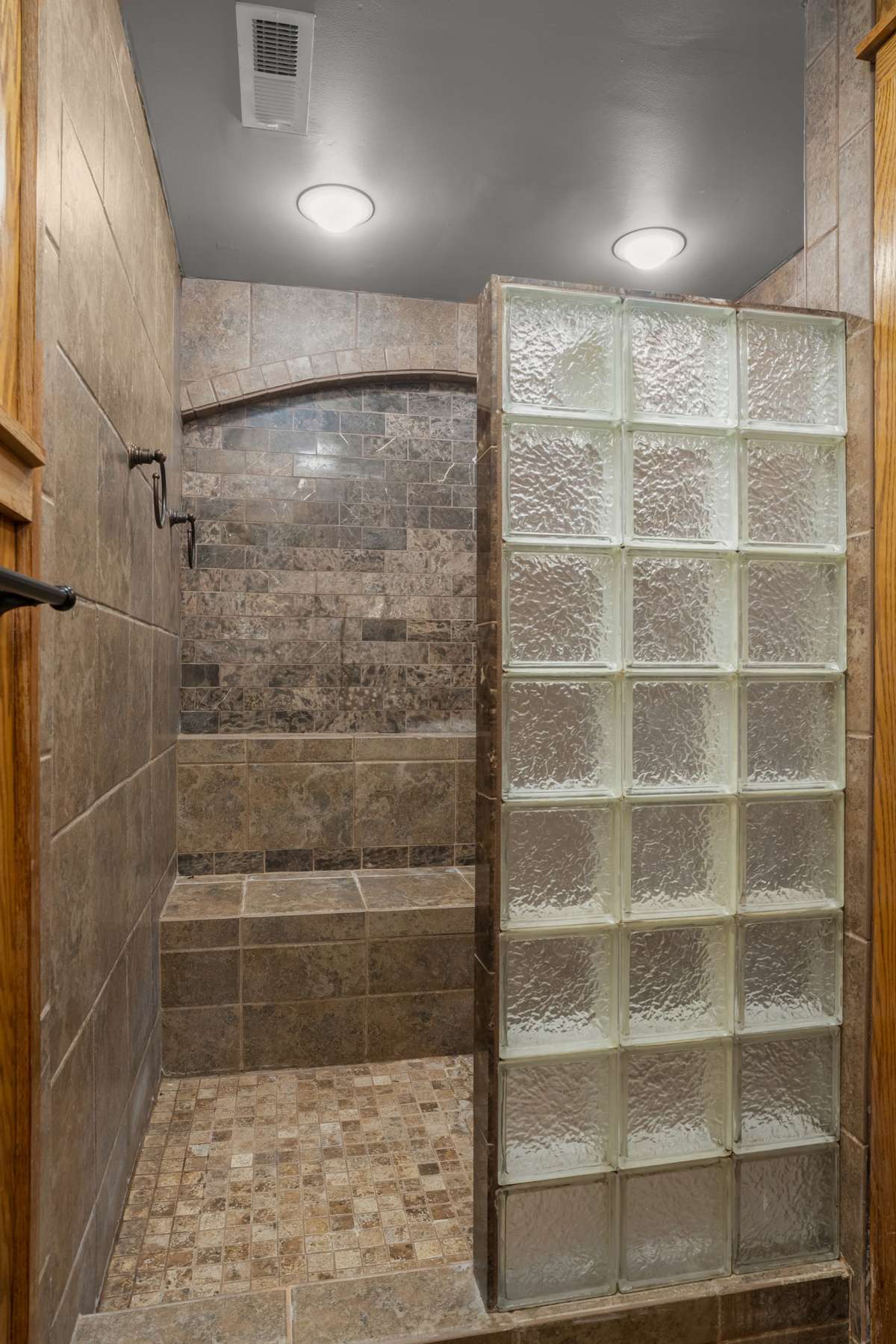 Nice custom walk-in tile shower.
