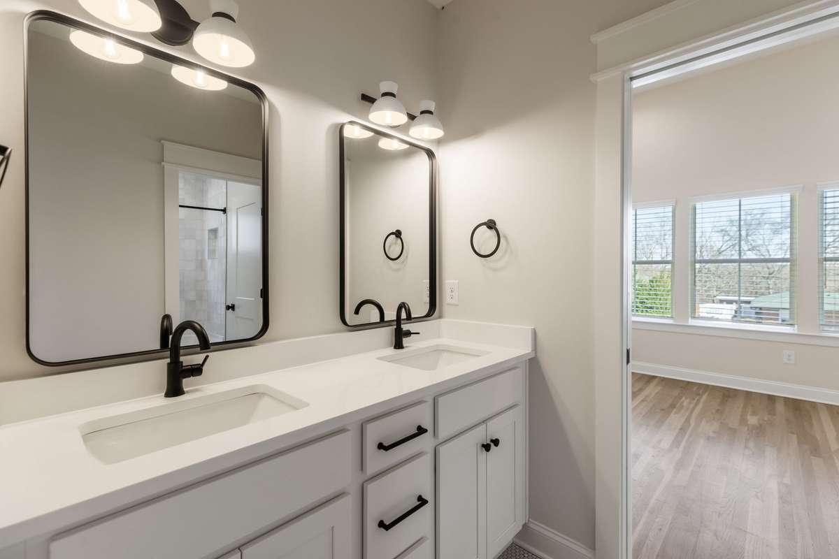Double vanities in bedroom baths