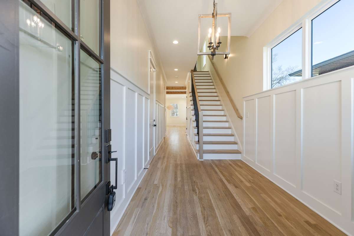 Entry Foyer with trim work and upgraded lighting