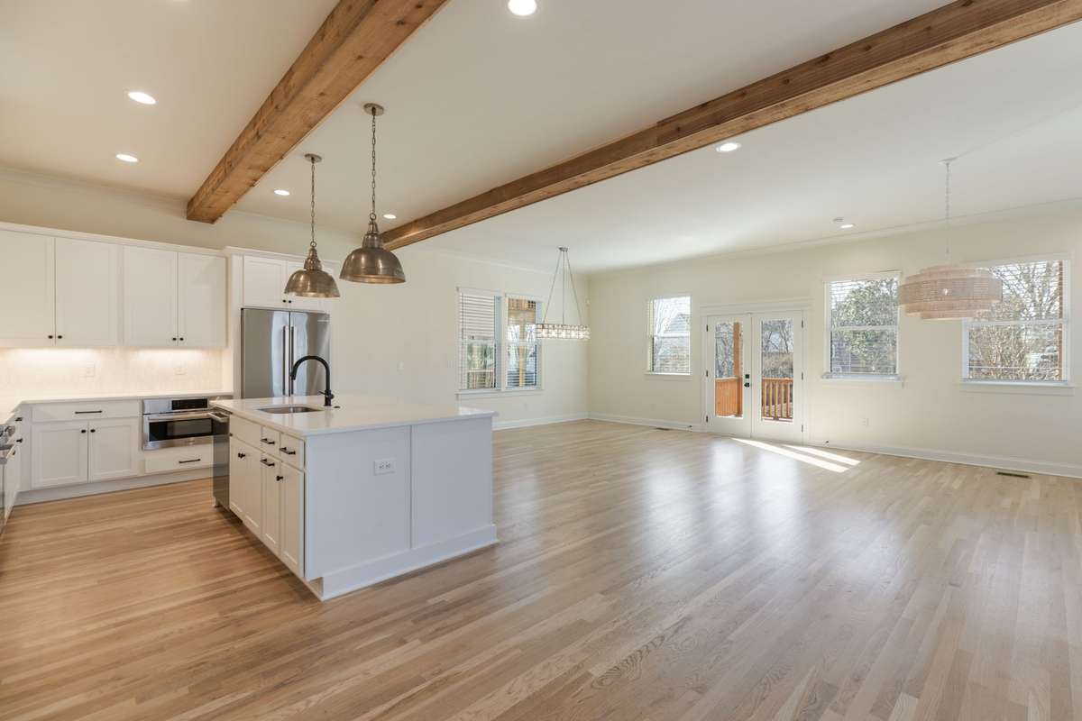 Large great room and open floor plan, eat in kitchen with upgraded lighting