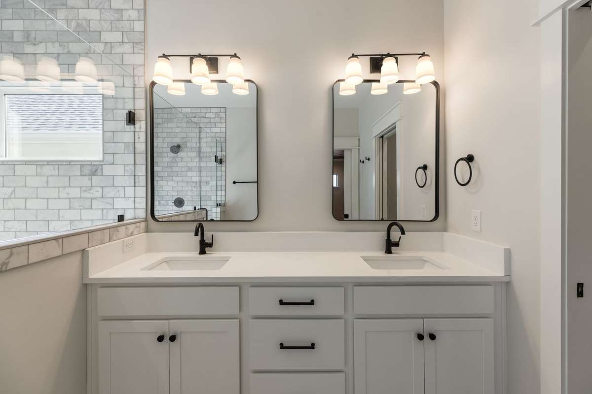 Primary bath with double vanities.