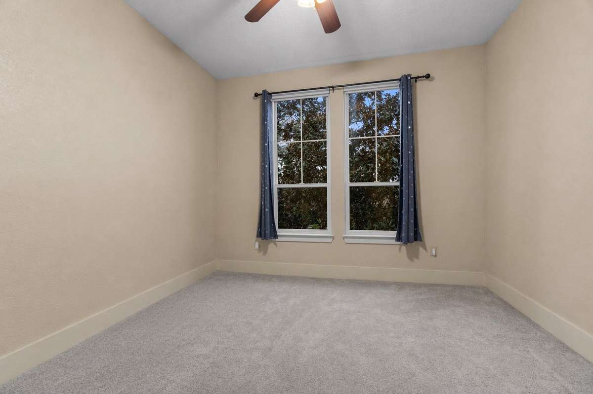 Bright and cozy secondary bedroom.