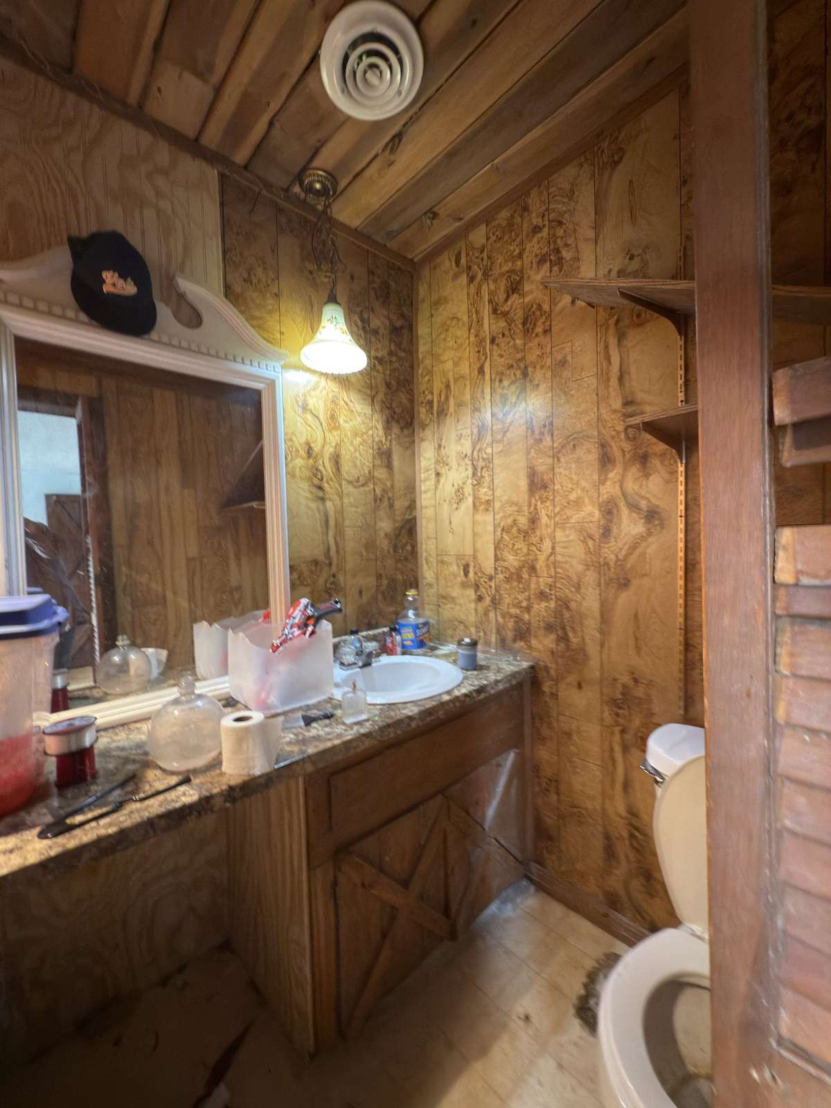 1/2 bath located off bedroom