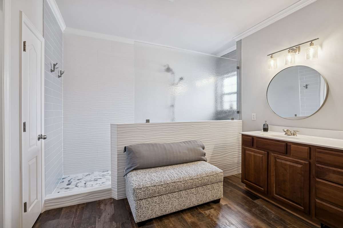Primary Bathroom - Luxury Living within your own home.  Notice the tile that goes from floor to ceiling.  Truly Beautiful!