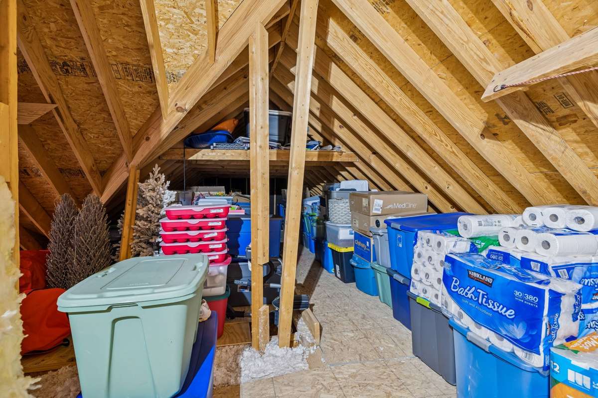 Storage Room - Located on the second level right off the Rec/Bonus room.  Tons and Tons of floored storage area.  You will absolutely love this!