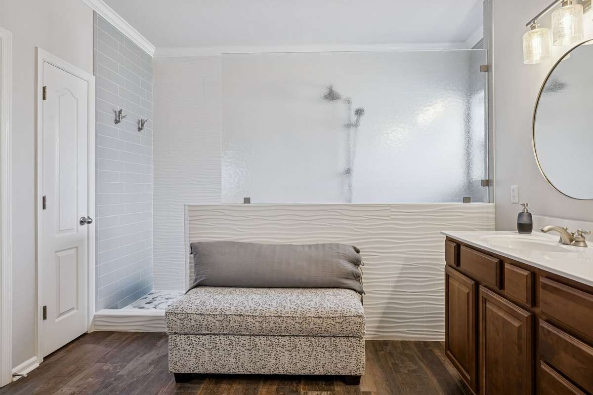 Primary Bathroom - Remodeled with a full walk-in shower, fully tiled from floor to ceiling.