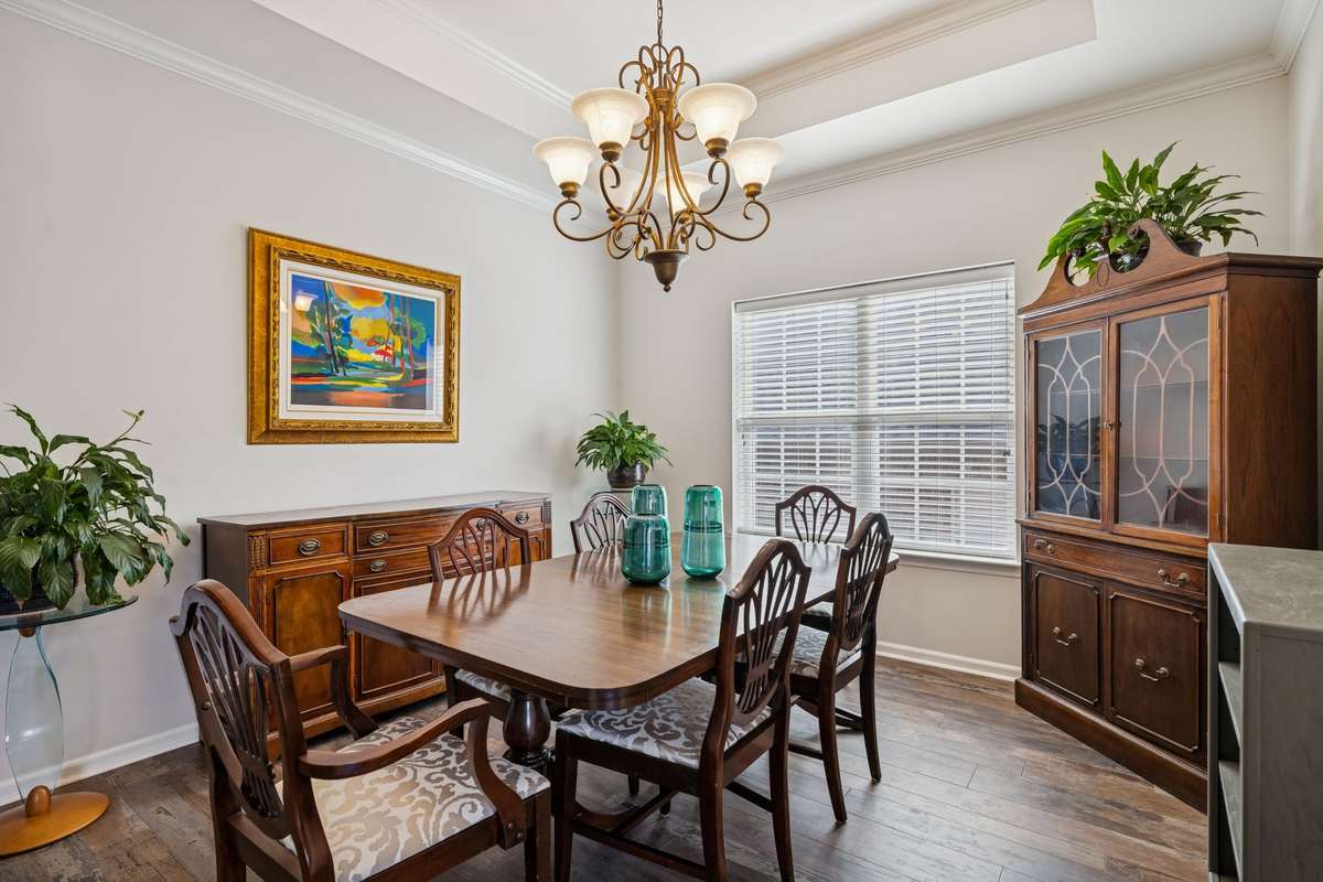 Dining Room - Notice the trey ceiling and the abundance of natural light.