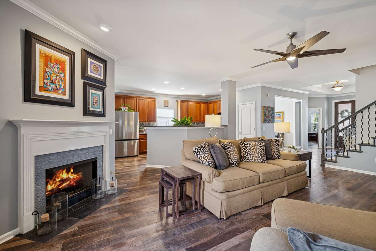 Living Room - Looking toward the Kitchen.  Notice the beautiful gas fireplace with newly tiled hearth.