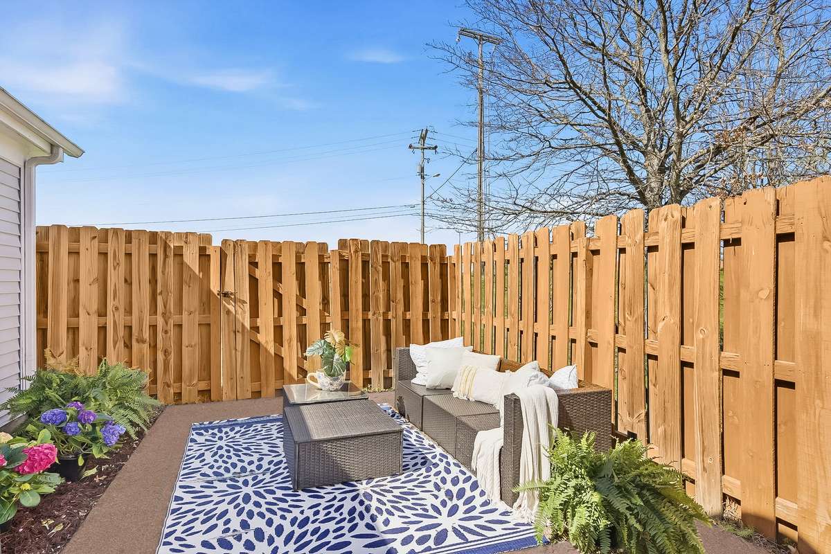 Your pets will love this private patio too. The side gate opens to a large green space.