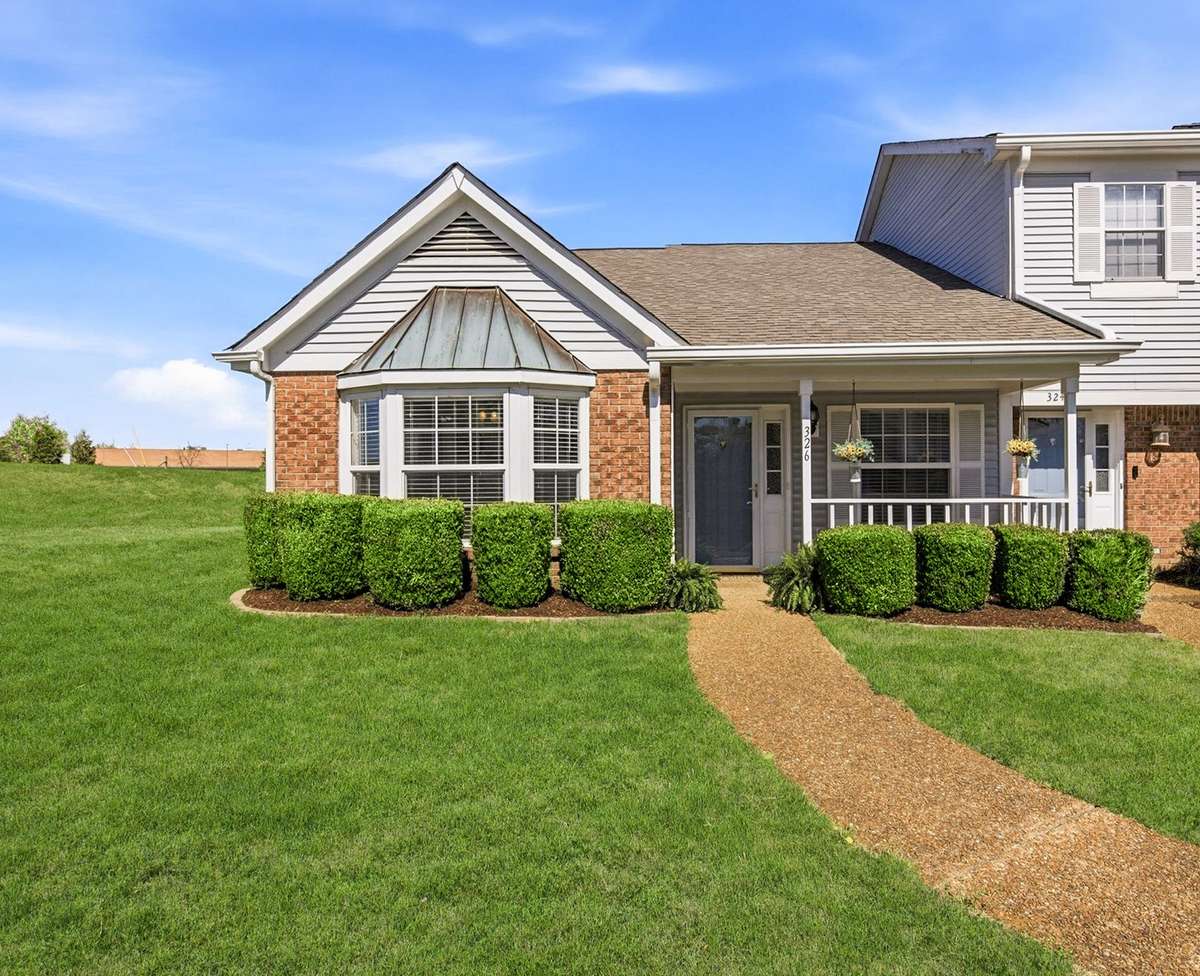 Nice large green space located on the side of 326 Ash Forge.