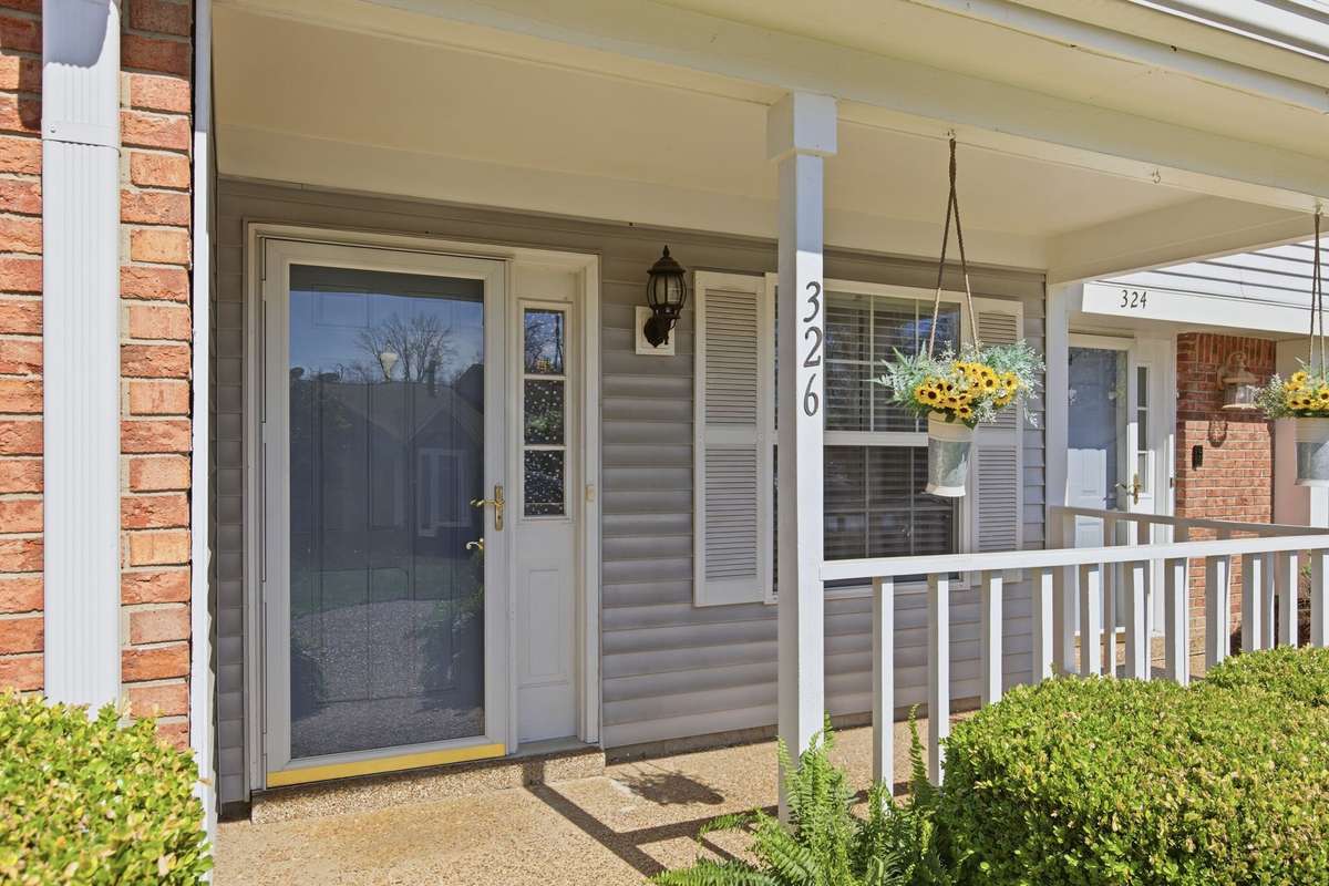 Front porch with plenty of room for a porch swing, rocking chairs, or outdoor furniture.