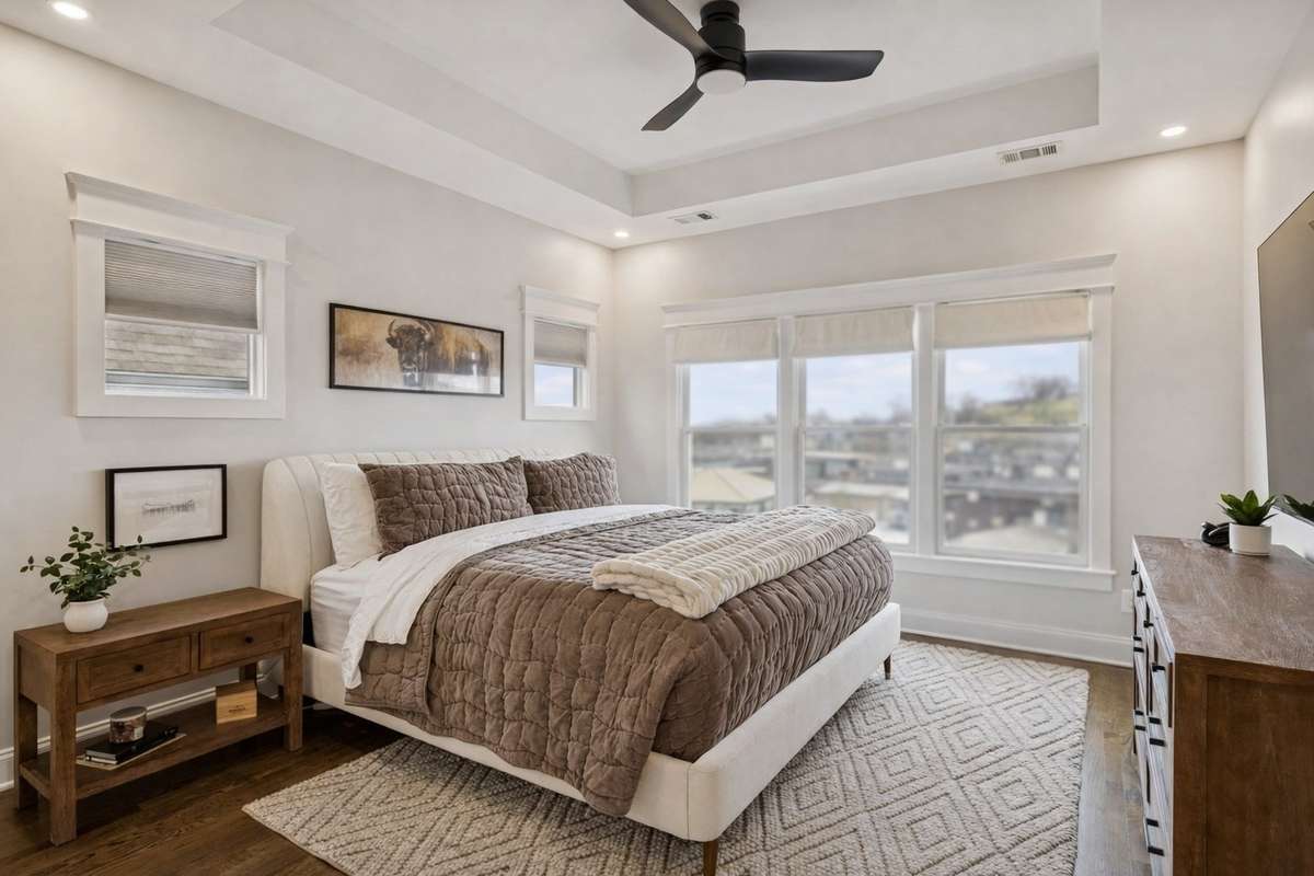 The primary bed has tray ceiling detail.