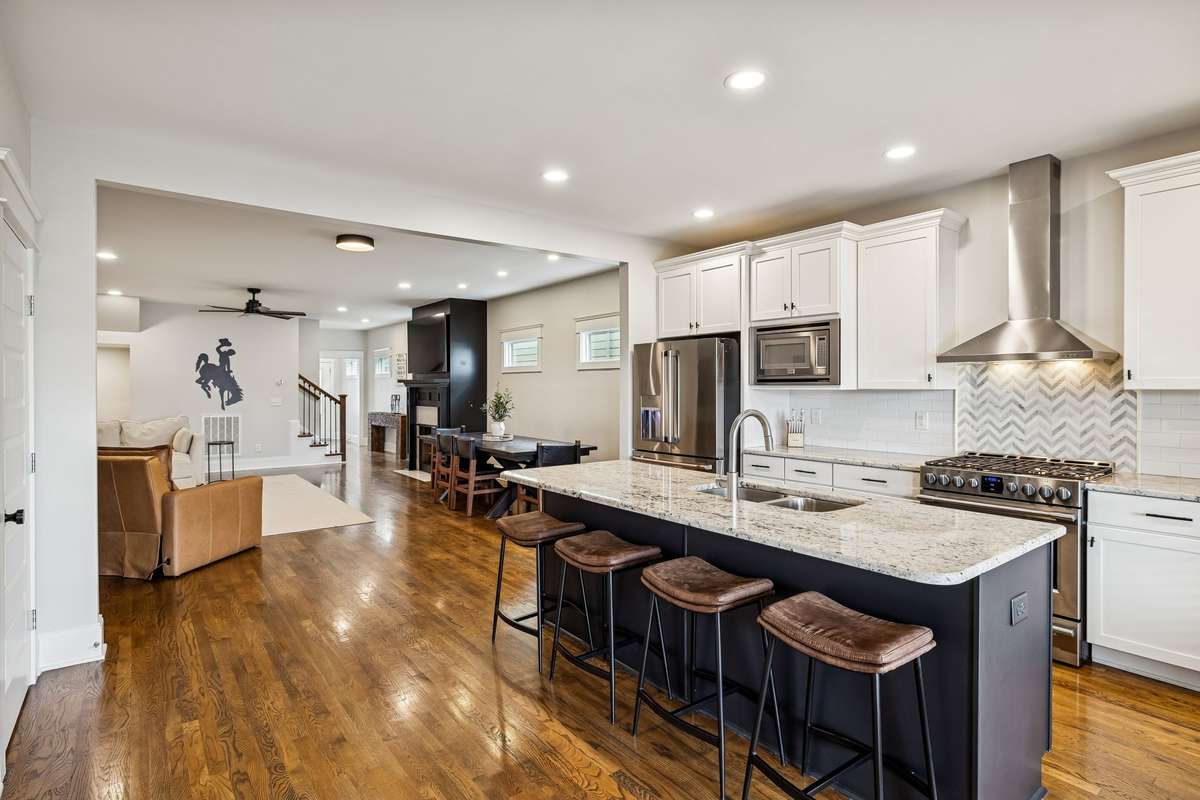 Kitchen flows seamlessly into the main living and dining areas, ideal for entertaining.