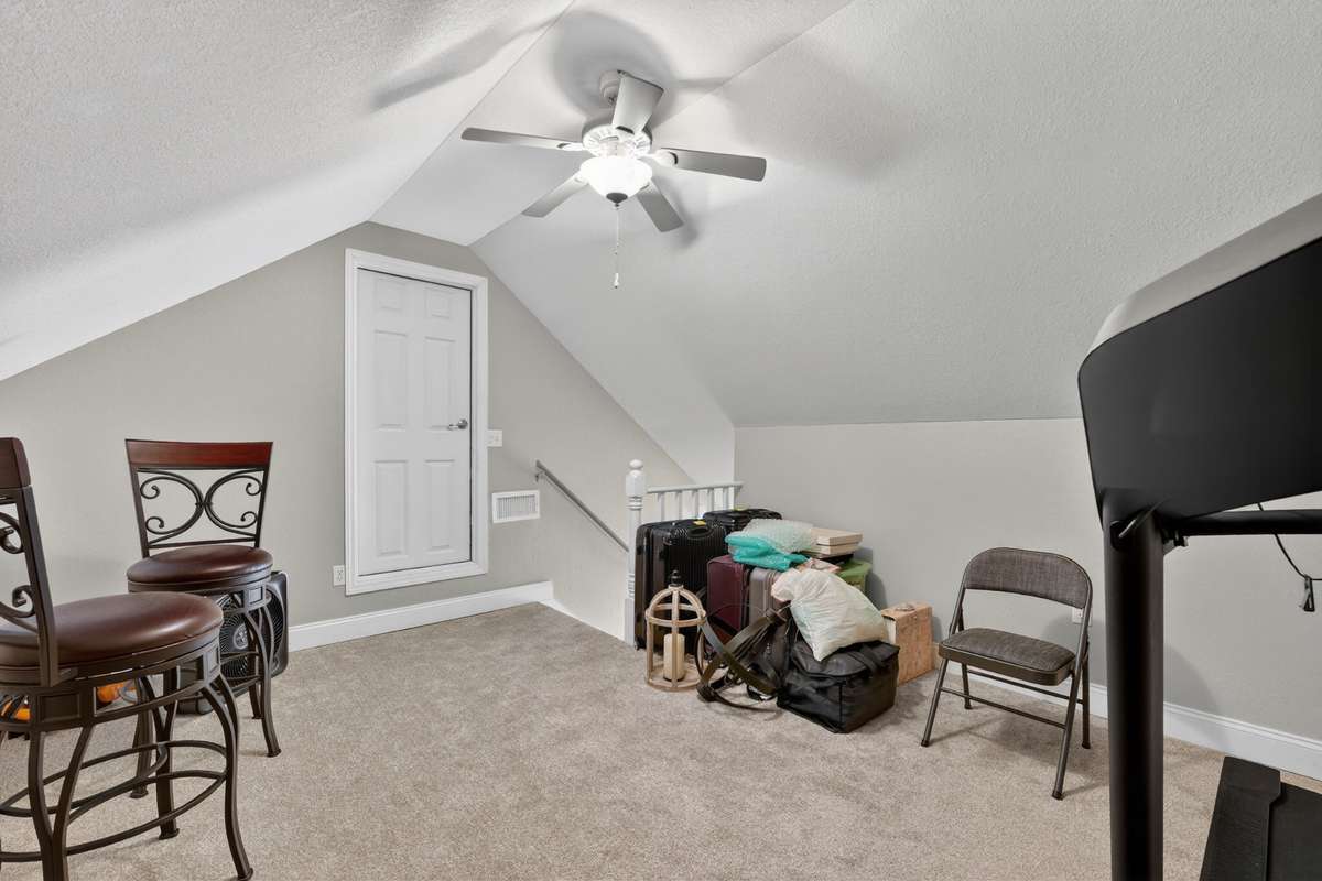 There's a door to the attic space in the upstairs bonus room.
