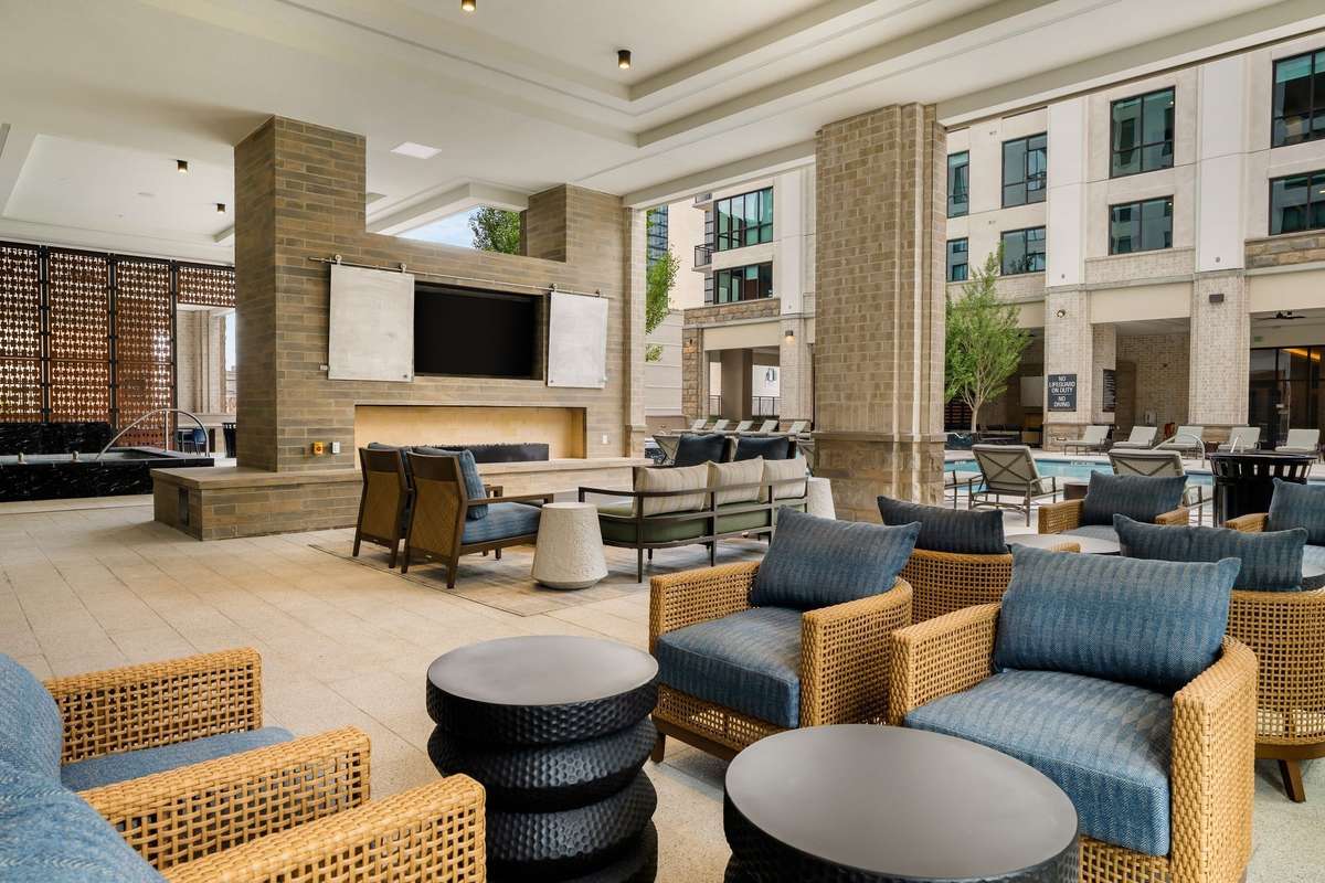 Level 3 - Expansive pool deck with hot tub, state-of-the-art fitness center, outdoor kitchens and living areas.