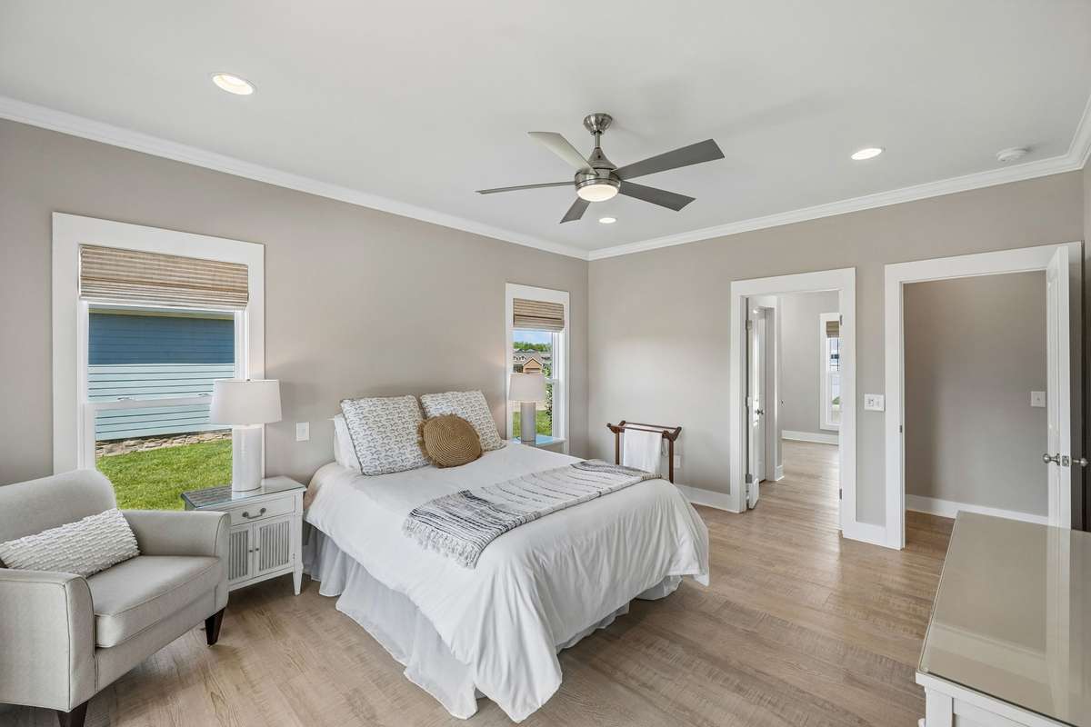 Notice the custom window treatments, those stay!
