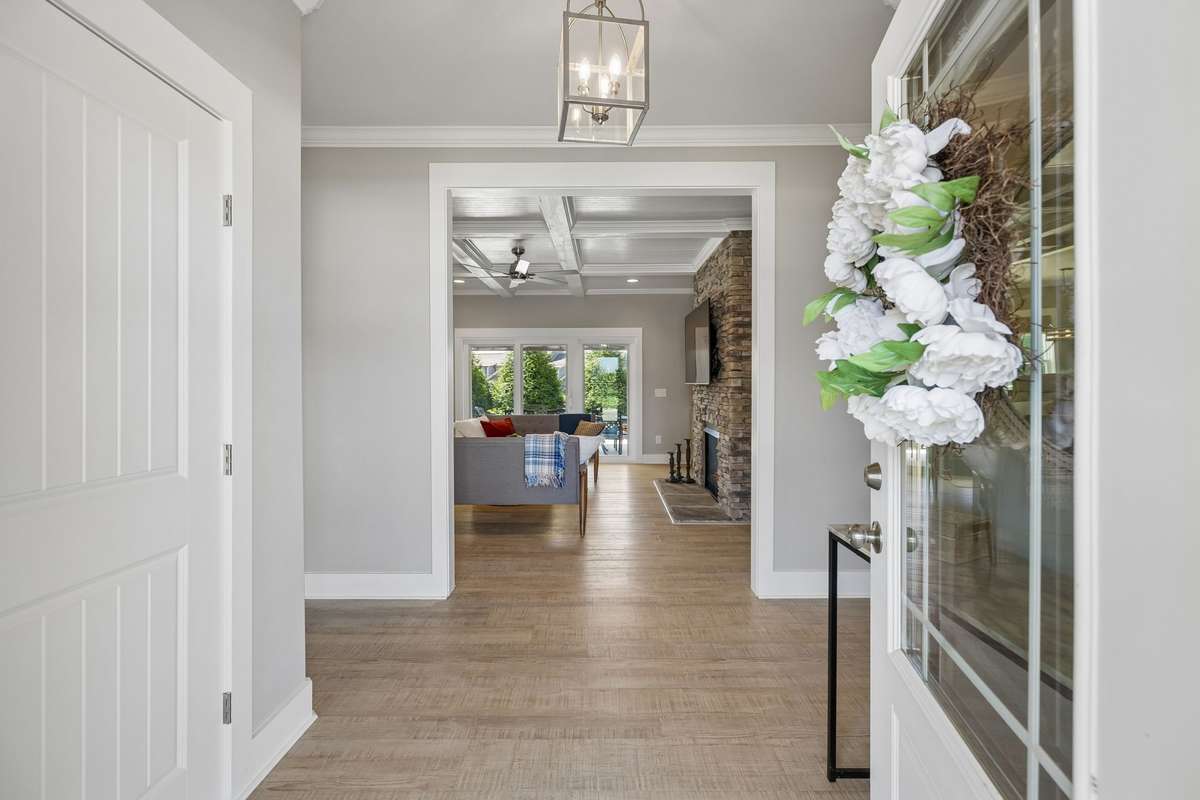 Welcome in! Coat closet to your left and entertainer's dream ahead!