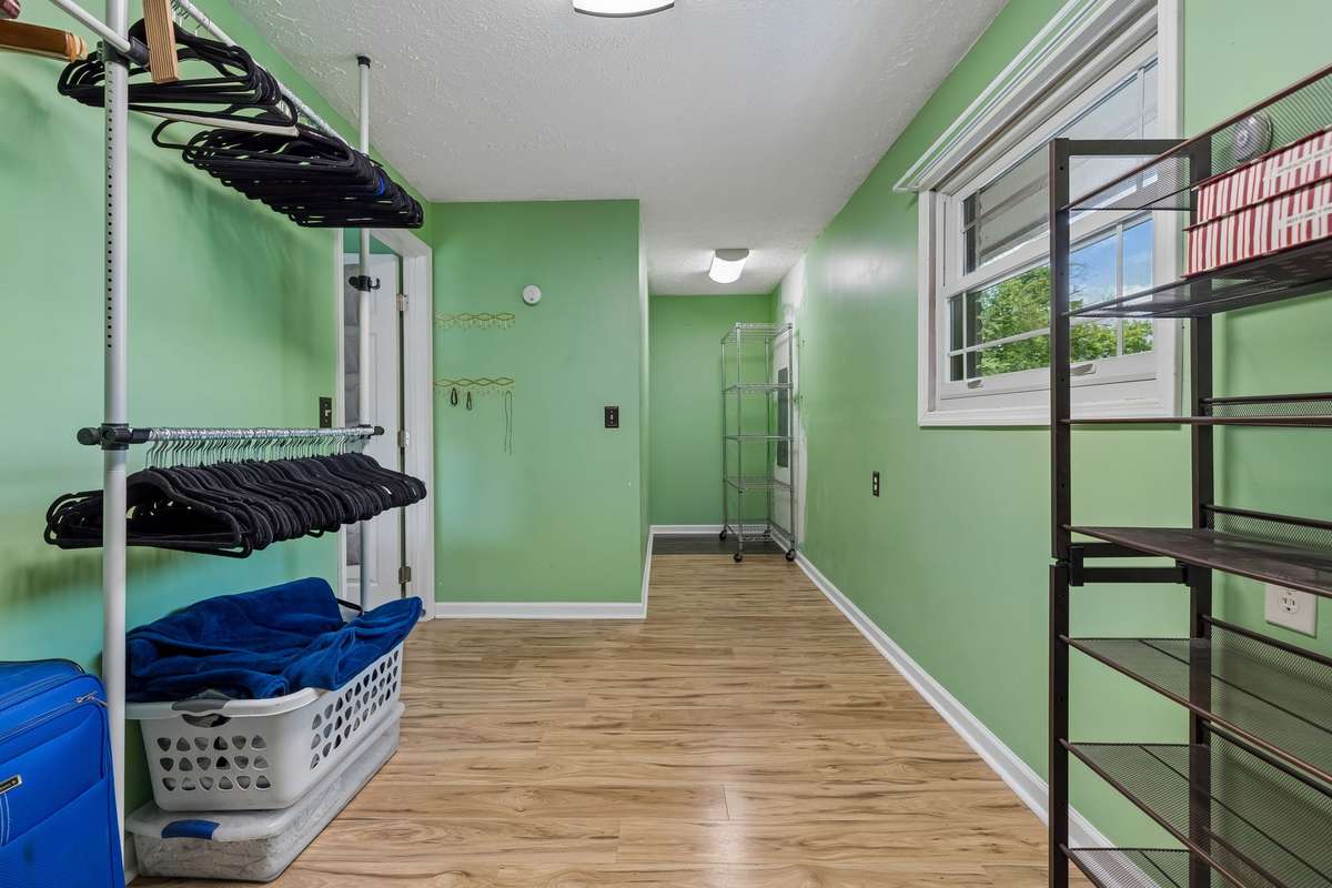 Very large walk-in closet in primary suite