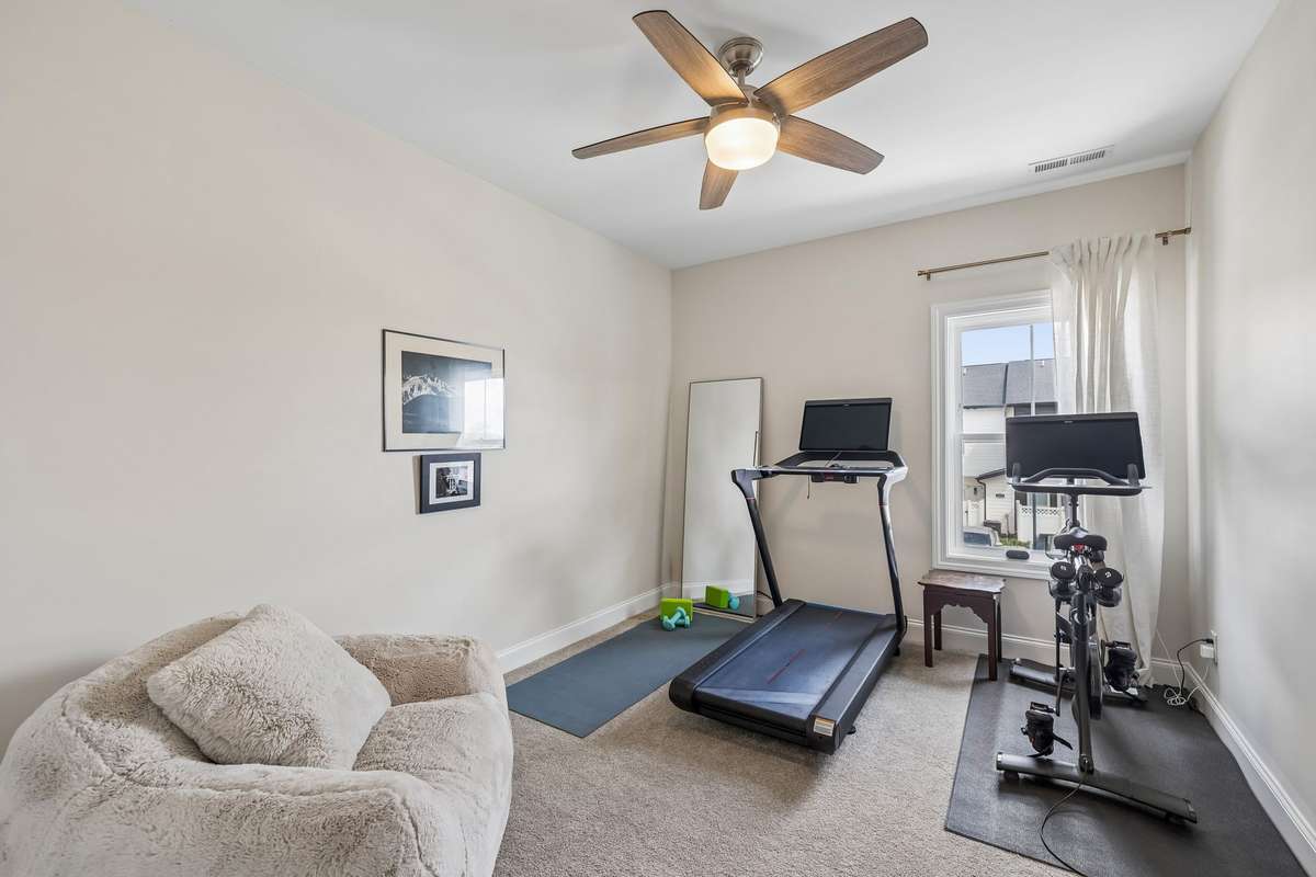 Bedroom #3 currently used as an exercise room