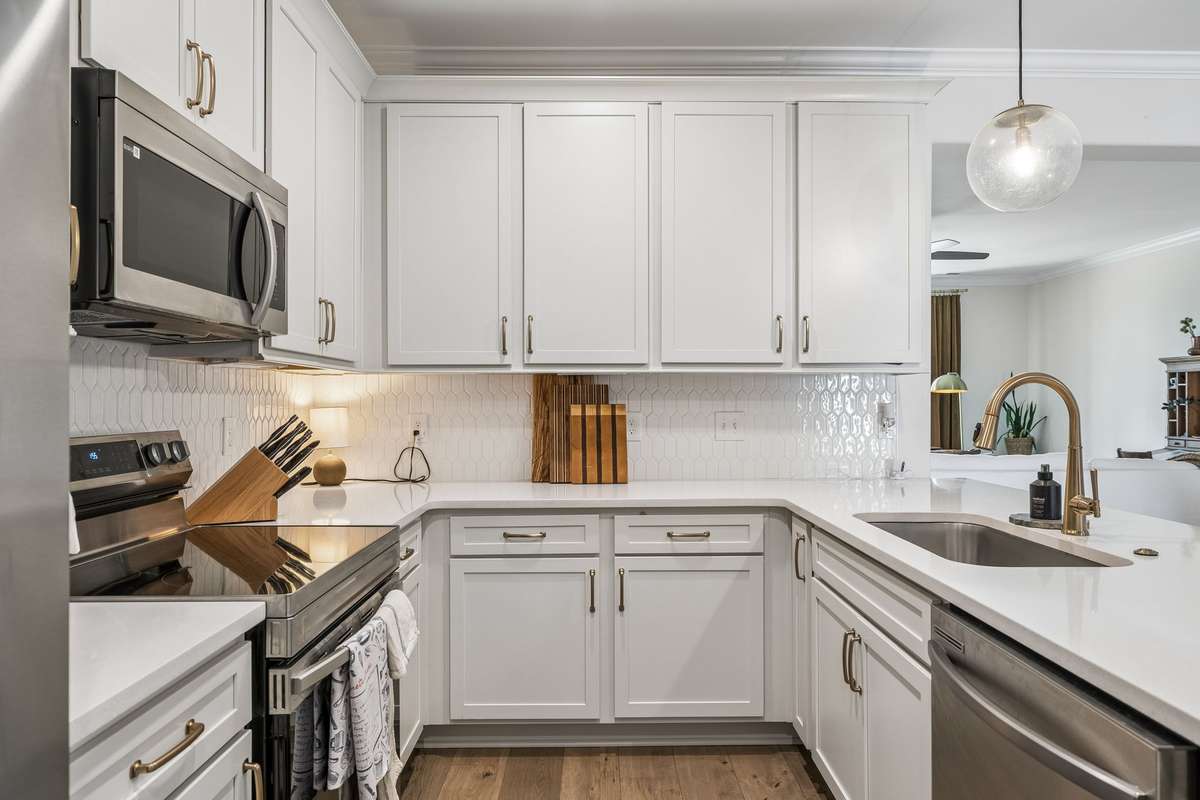 Microwave, Range and dishwasher included,  even a garage disposal.