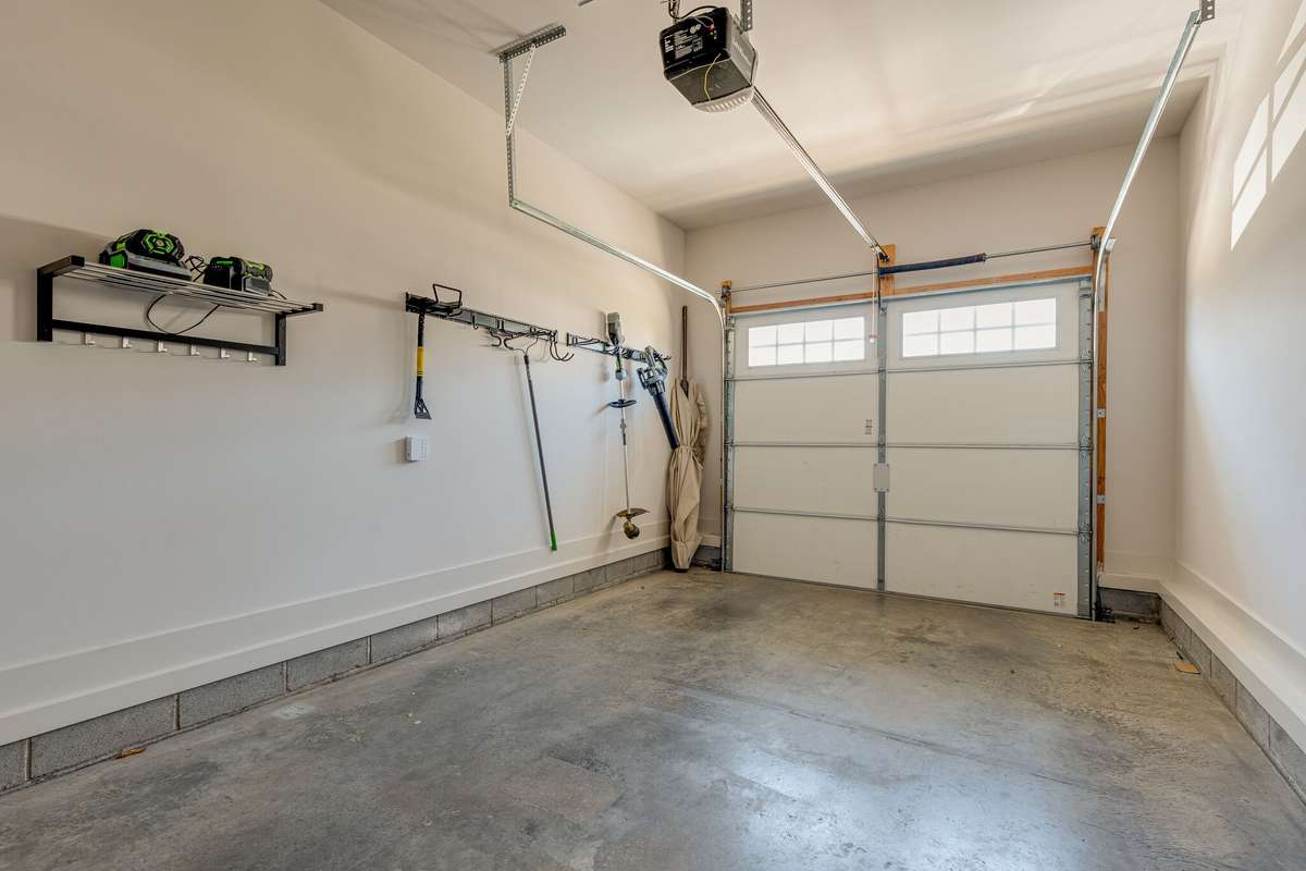 Large 1-car garage attached at the front.