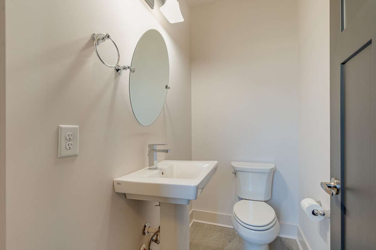 1/2 bath in hallway entrance as you enter the house.