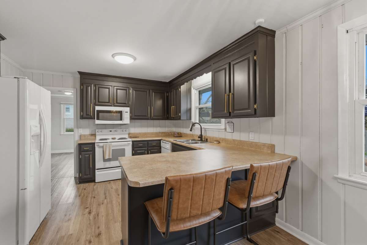 Kitchen is open to the eat in area and has some nice upgrades.