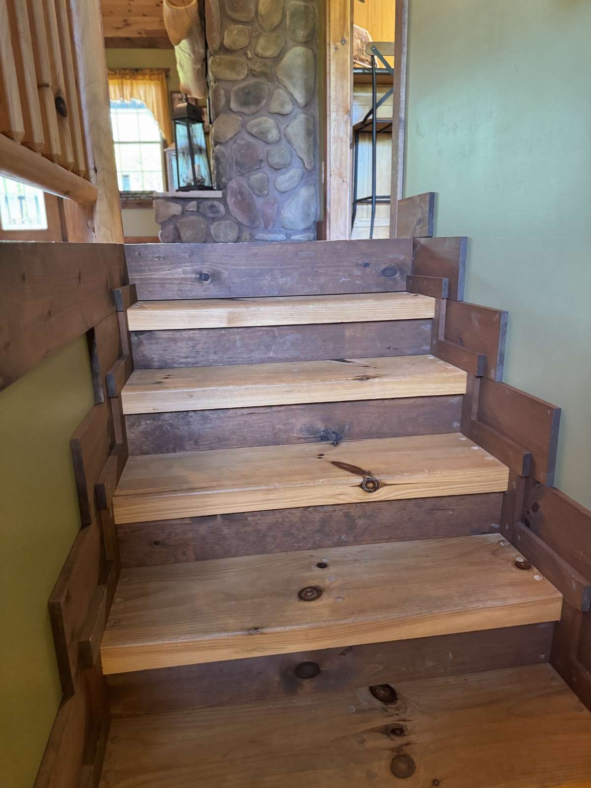 Stairs leading to the fully finished bottom level