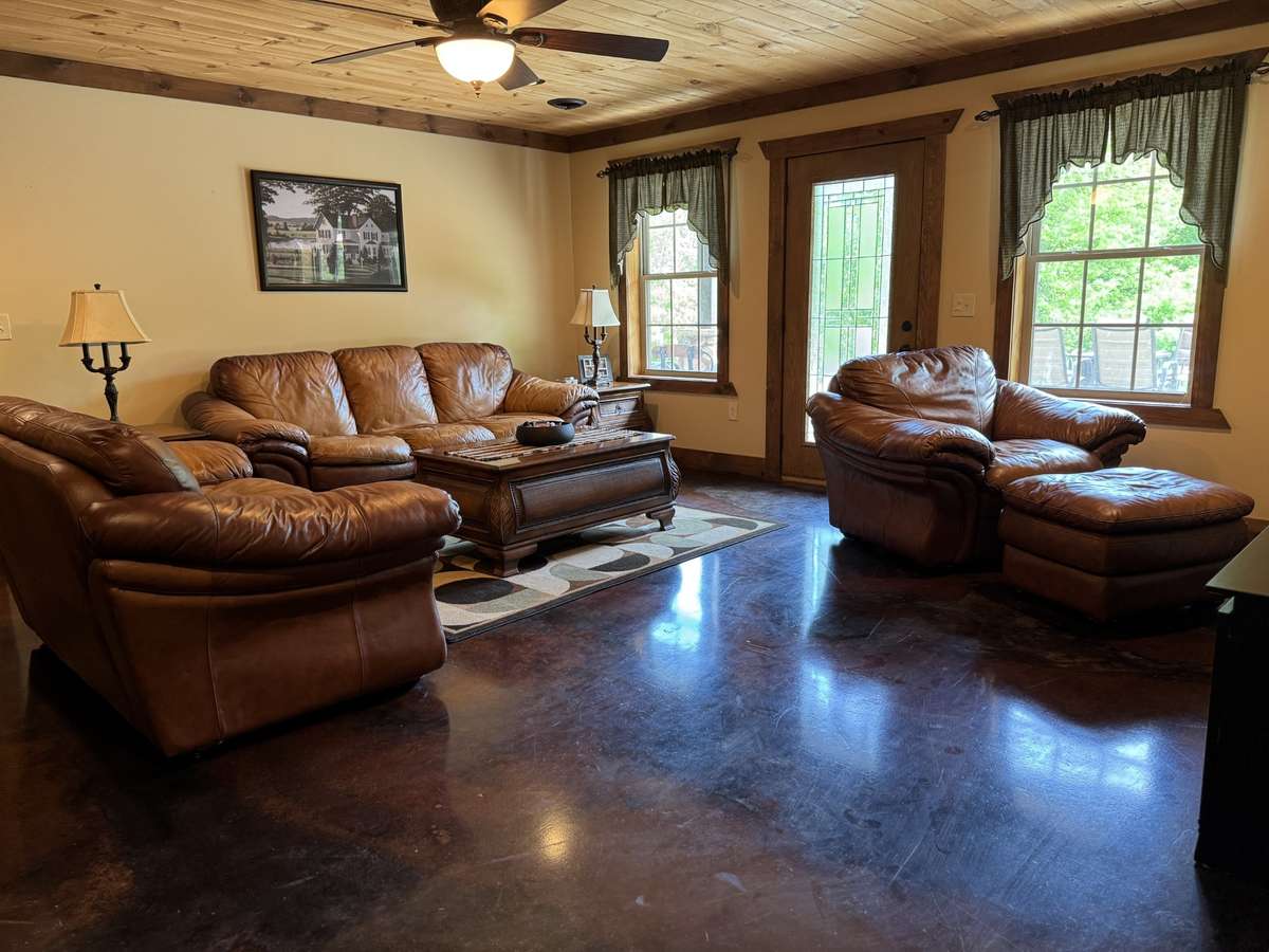 This huge second living room space has a door leading to your backyard and huge patio area.