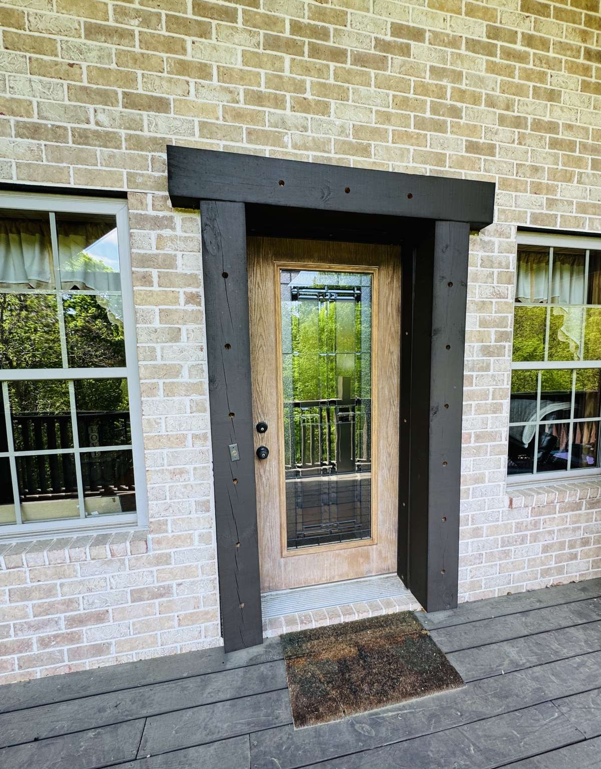 Entry door off the balcony also upgraded to match the beauty and style of this entire home.