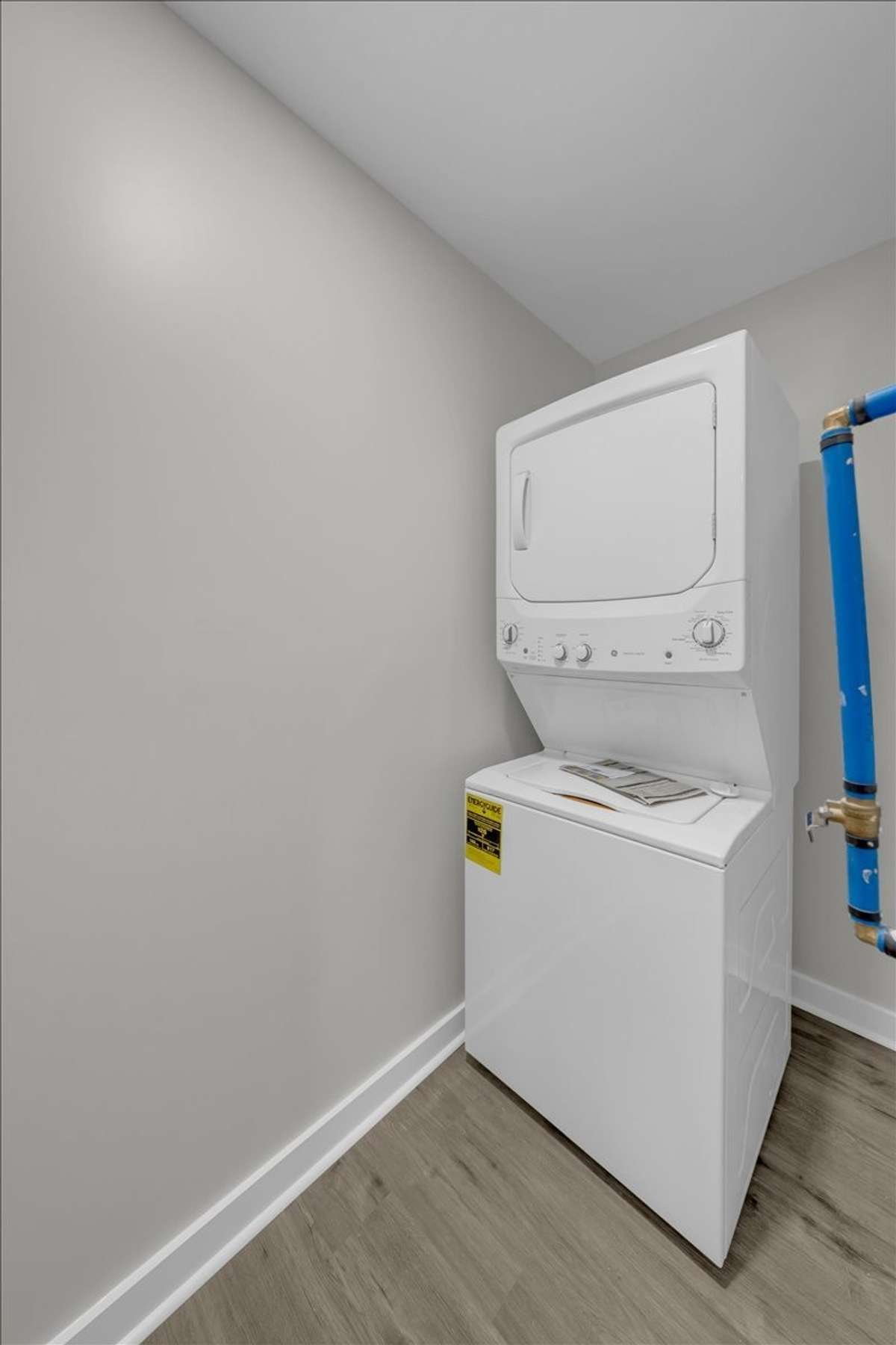 Laundry Room with a new stackable Washer/Dryer included!
