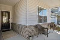 The covered front porch is large enough for seating, a great place to enjoy your morning coffee.