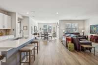 Airy open-concept living and dining — perfect for entertaining!!
