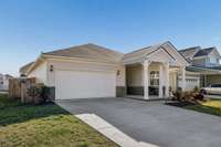 1216 Inverness Pass has a 2 car garage and wide driveway which provides plenty of parking for guests!!