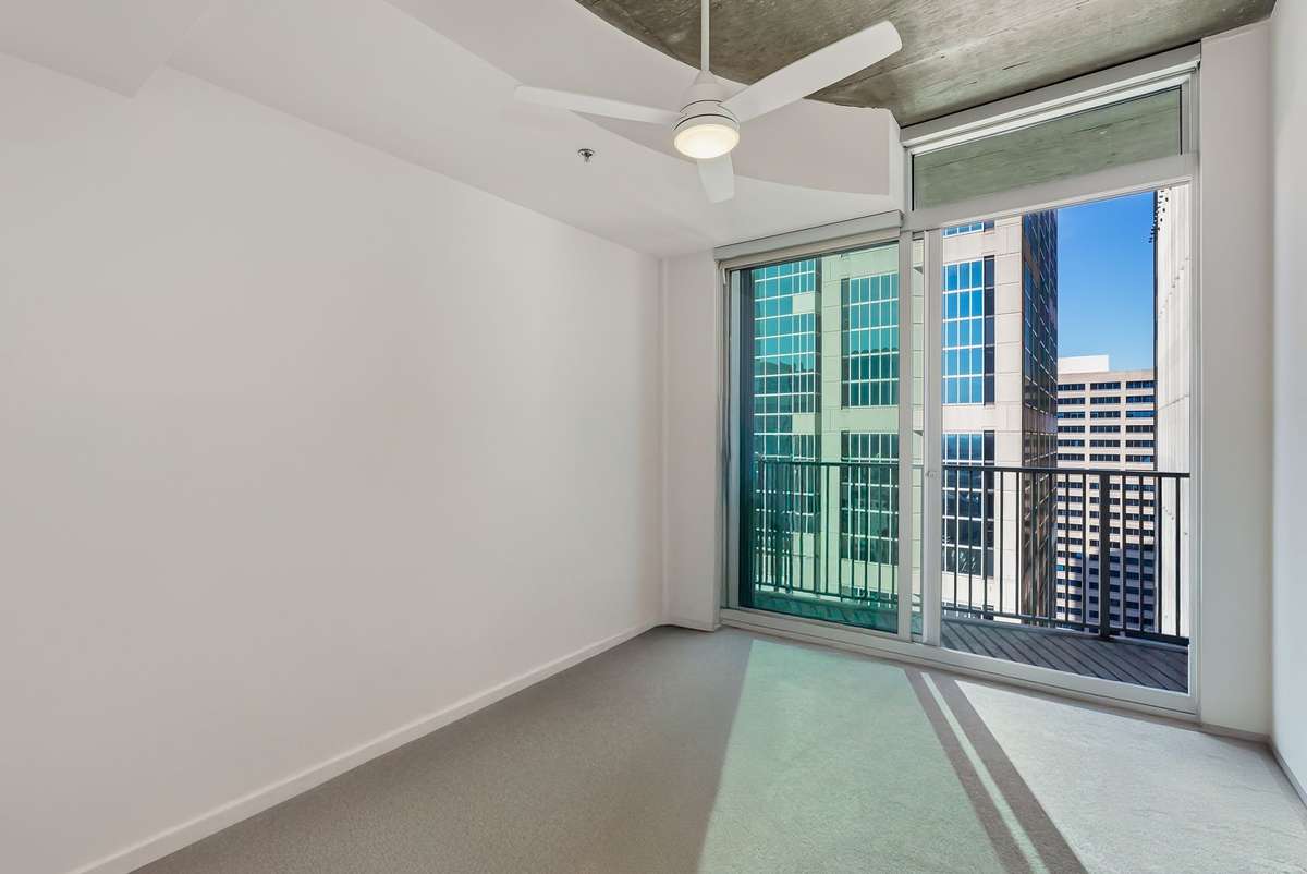 Secondary bedroom with balcony access