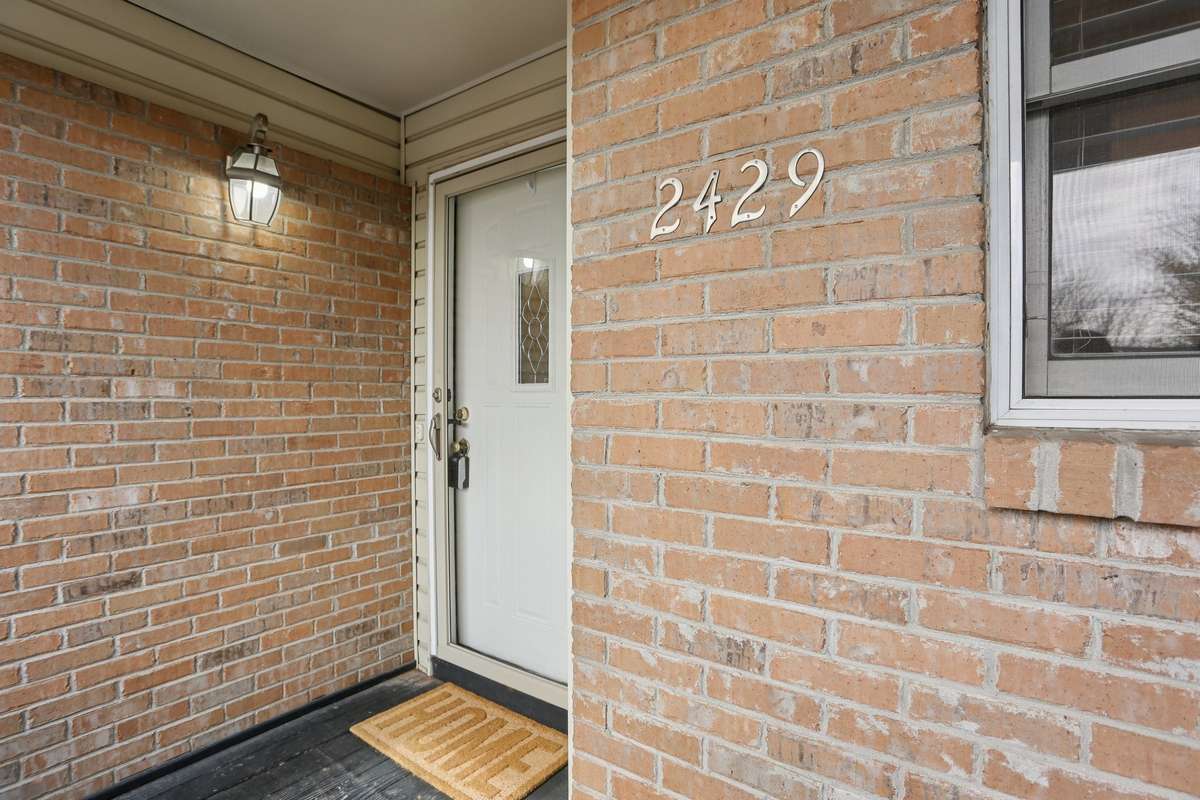 The front door also has a storm door to let in more light.