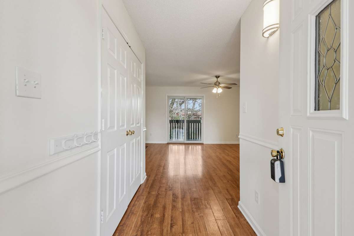 The foyer has a huge coat closet, chair rail and new lighting.