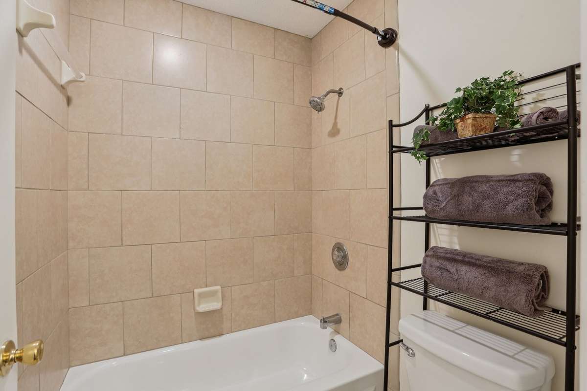 This bath makes it easy for 2 people getting ready in the morning. There is a door that gives privacy between the vanity and the shower area.