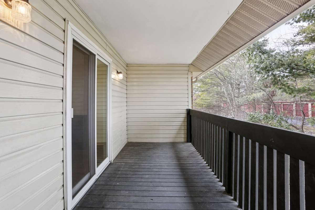 The balcony is a great space to kick back and relax.