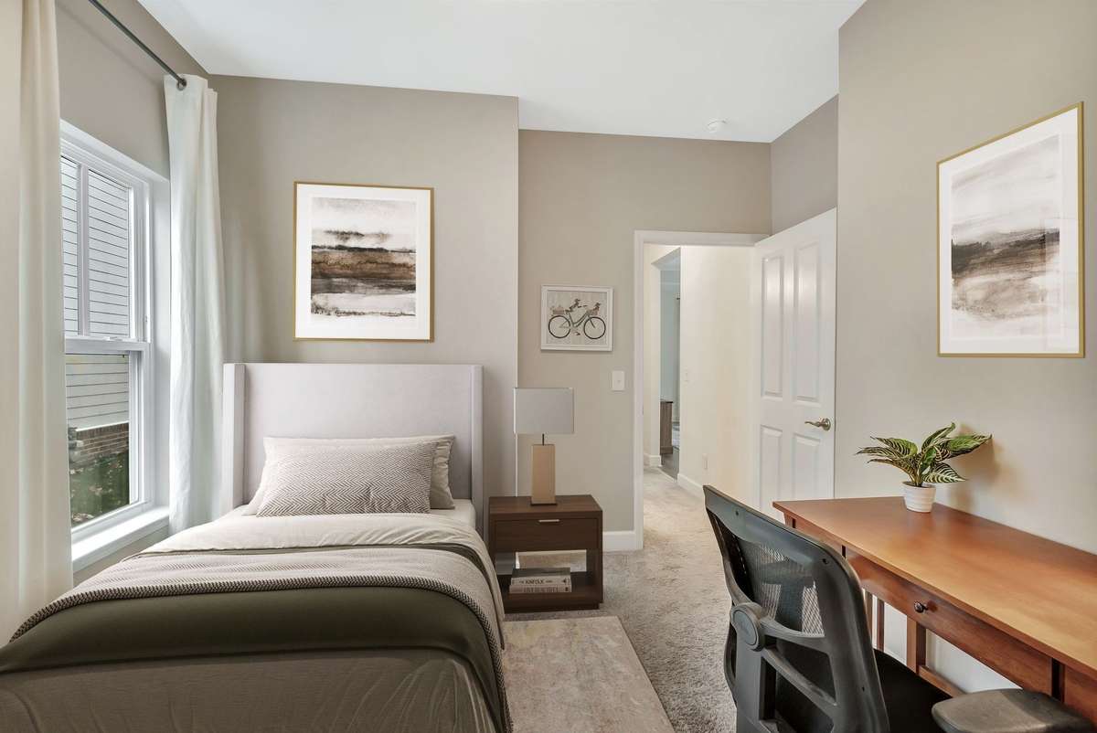 This is what the room can look like as a bedroom (with the option to have a dresser where the desk is)